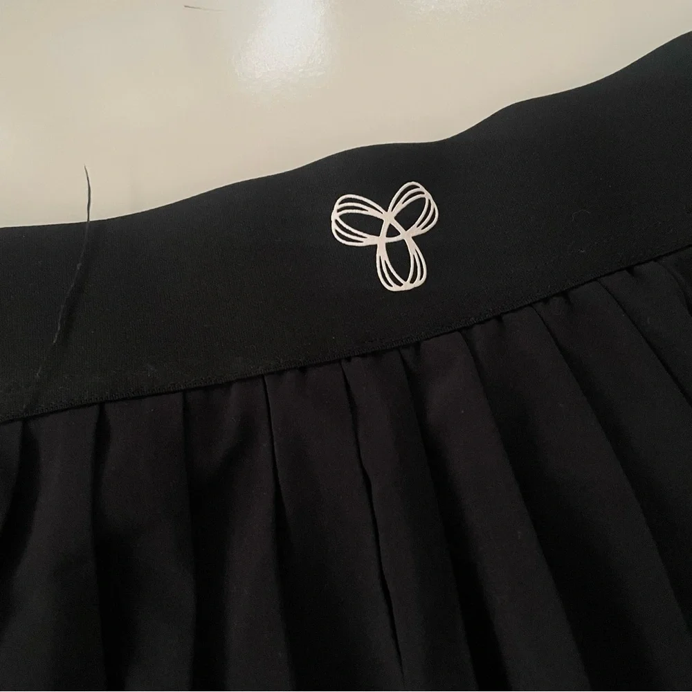 Aritzia Tna TnaMove Tennis ProMicro Pleated High Rise Skirt Skort Black Size XS